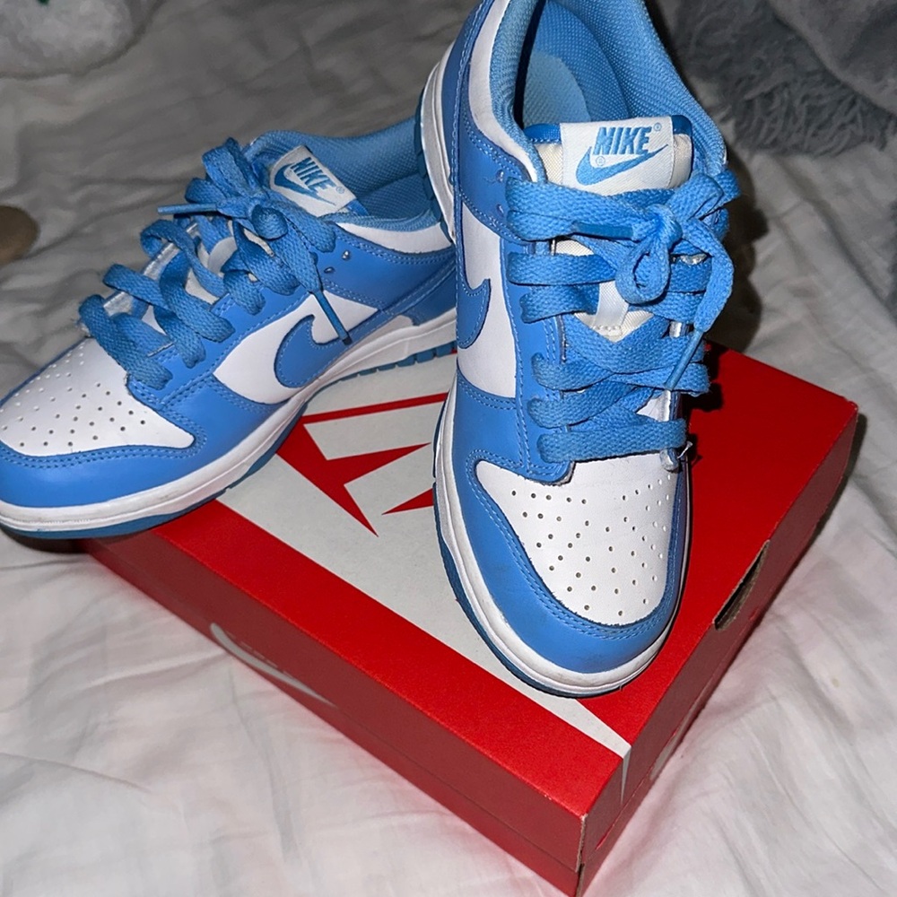 Nike Blue dunks
 is labeled as 4Y in boy size but can fit a 6 in women